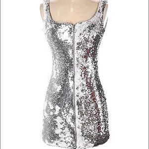 NEW with tags! Never before worn sequin cocktail dress. Middle zip.